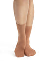 Child wearing tan ribbed dance socks from the back