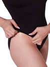 Close-up of Bunheads Hold It Body Adhesive being applied to upper leg.