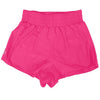 Haute pink high-waisted dance shorts laid flat.
