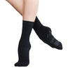 Close-up of dancer wearing black dance socks showing foot and ankle fit