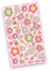 A sheet of colorful retro-style stickers featuring smiling flowers, peace signs, butterflies, a bee, and musical notes on a pink wavy striped background. The brand name 'Hot Focus' is visible in the bottom right corner.