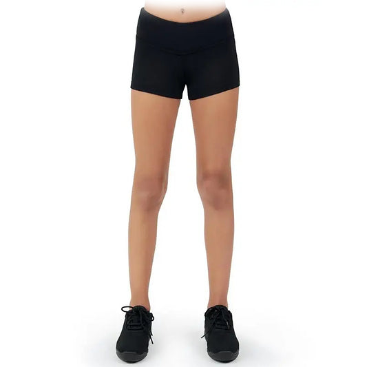 Child wearing black Capezio gusset dance shorts paired with black dance sneakers