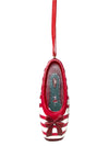 Red and white striped pointe shoe ornament with a red ribbon hanger, shown from the front.