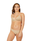 Child model wearing nude deep-neck bra with clear back strap, front view