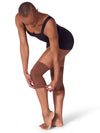 Nude gel dance kneepad worn while bending forward.