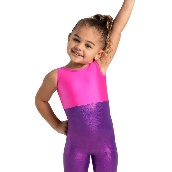 Child wearing pink and purple sparkly biketard front view with arm raised