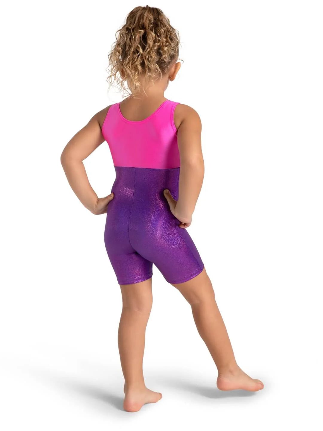 Child wearing pink and purple sparkly biketard back view