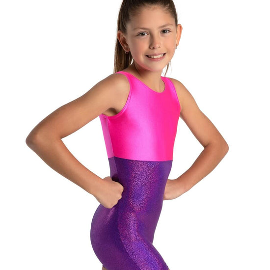Child wearing pink and purple sparkly biketard front pose with hands on hips