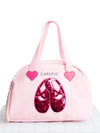 Pink Capezio tote bag with a reversible sequin ballet shoe design on the front and short carry handles.