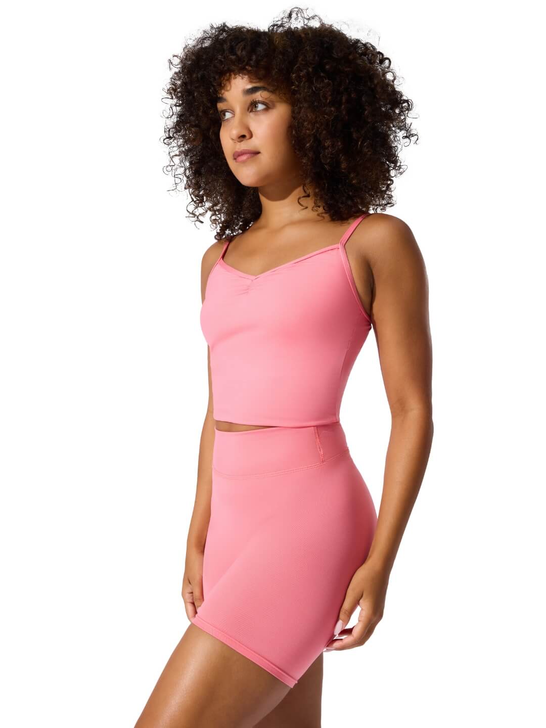 Side view of dancer wearing Flamingo pink pinched front camisole