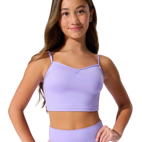 Dancer wearing lavender ballerina pinched front camisole with coordinating dance shorts
