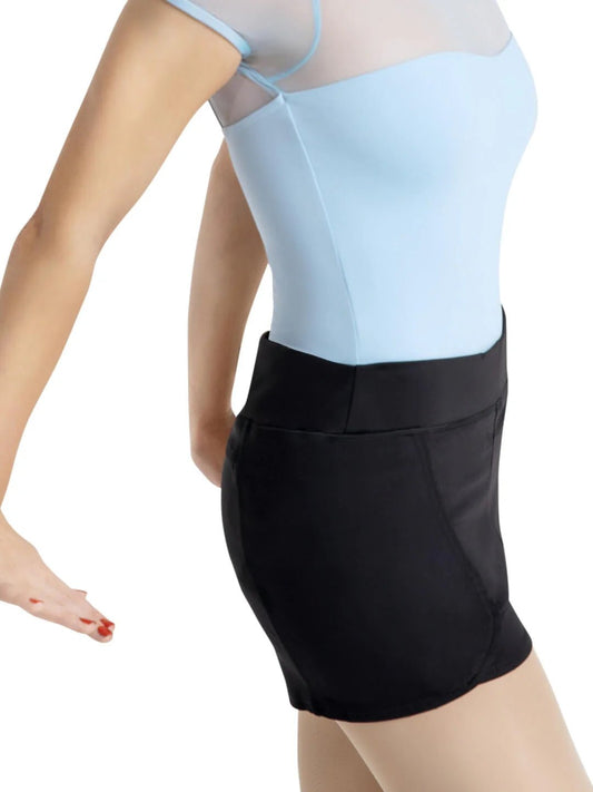 Side view of black dance shorts with built-in briefs showing fit on a dancer