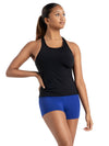Front view of black racerback tank top paired with blue dance shorts