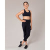 Child dancer wearing black 7/8 length leggings styled for dance class.