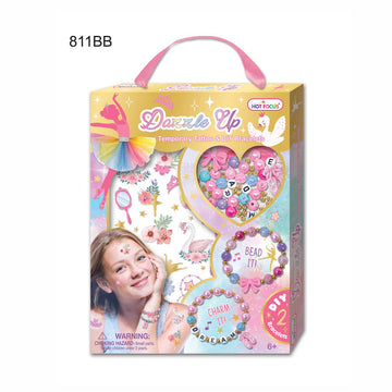 Hot Fusions Dazzle Up Temporary Tattoos and Beadarts kit in its original retail packaging, featuring a pink carrying handle and colorful graphics of a fairy, swan, and a child wearing temporary tattoos and a beaded necklace.