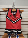 Red mini cheer top and skirt set displayed on a rack