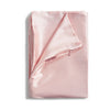 Blush satin pillowcase laid flat.