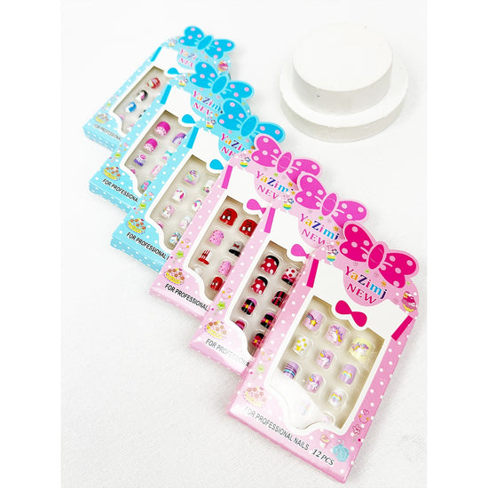 Assorted Love and Repeat kids press-on nail sets in colorful packaging