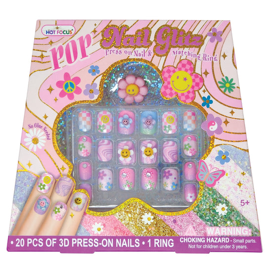 A boxed set of pink 3D press-on nails with a ring of matching nail stickers. The packaging is decorated with pastel pink, blue, yellow, and green floral graphics, glitter-style borders, and a photo of a hand showing the nails applied.