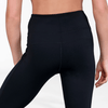 Side view of black flared dance pants showing fitted waistband and flared leg shape.