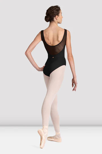 Adult dancer wearing black V-neck leotard, full body side view