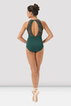 Adult dancer wearing pine green printed halter dance leotard, back view