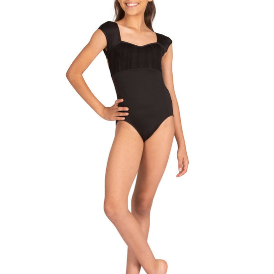 Child model wearing a black sweetheart cap sleeve leotard with textured front bodice