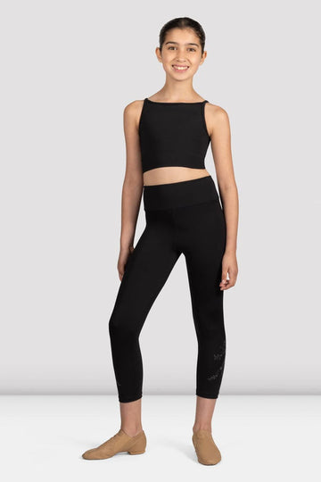 Child dancer wearing black Bloch Mirella Glow Girl twist back crop top with leggings