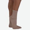 Nude performance dance sock worn on foot, side view