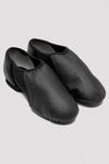 Pair of black slip-on leather jazz shoes on a white background.