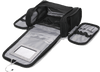 Black hanging travel cosmetics bag opened to show multiple zippered compartments and interior sections.