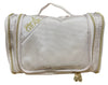 Sand-colored hanging travel cosmetics bag with clear front panel and top handle