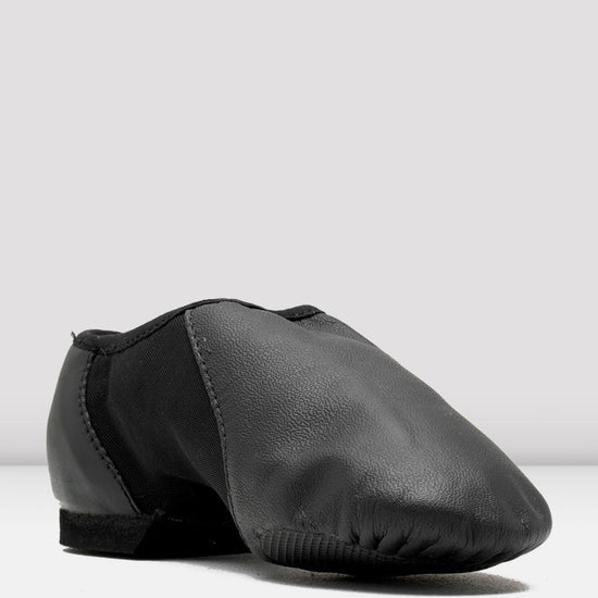 Front angled view of a black slip-on leather jazz shoe on a white background.