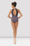 Adult dancer wearing dusk color printed halter dance leotard, back view