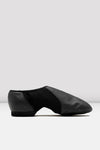 Side view of a black slip-on leather jazz shoe on a white background.
