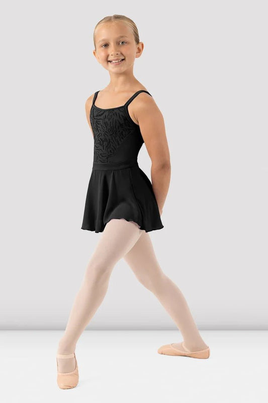 Girl wearing black skirted camisole leotard front view with attached skirt